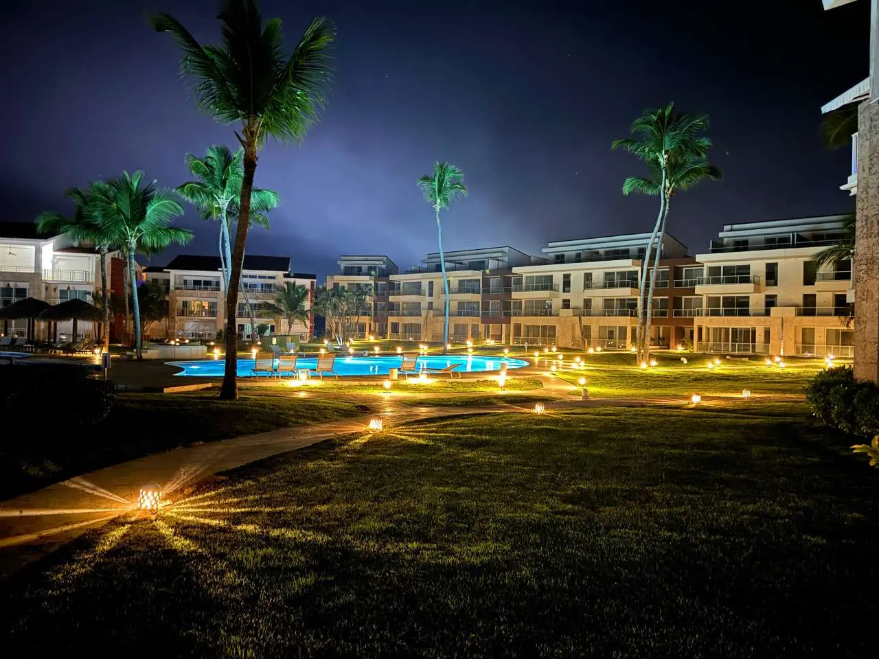 View of the Ocean View Apartments complex at Playa Palmera beach resor at night 